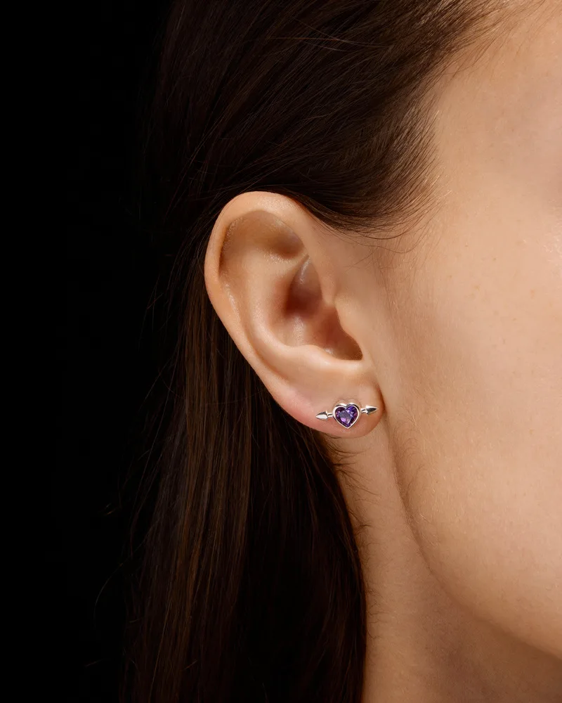 Sterling silver stud earring with a heart-cut amethyst