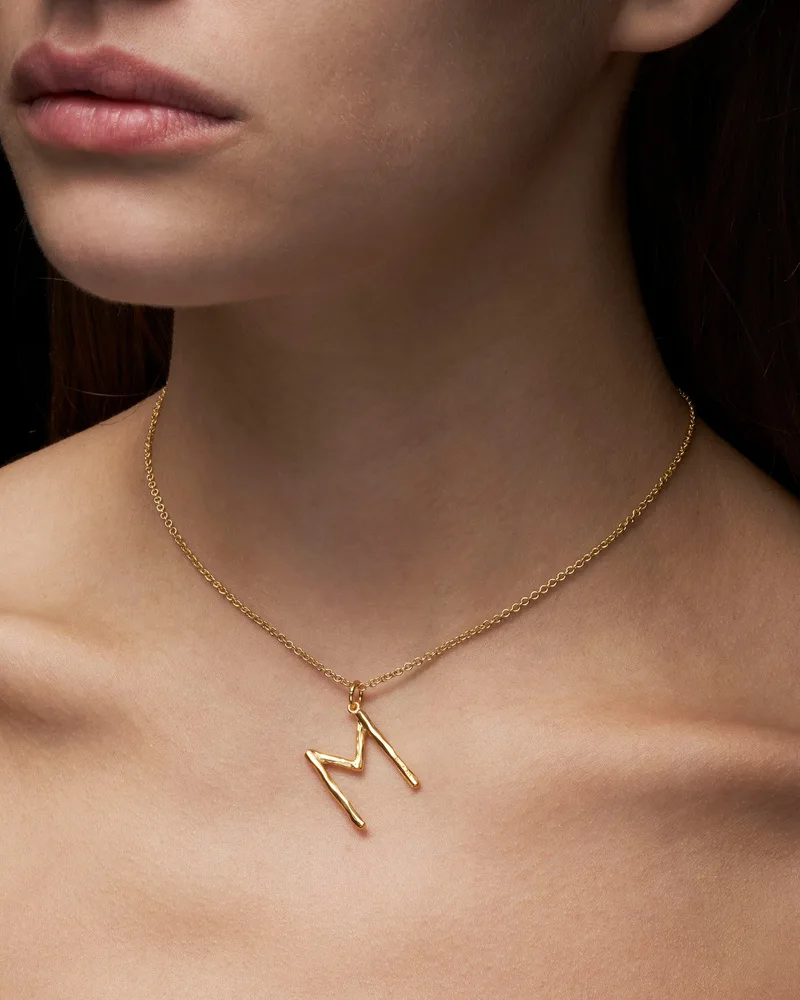 Sterling silver initial letter pendant on a fine chain