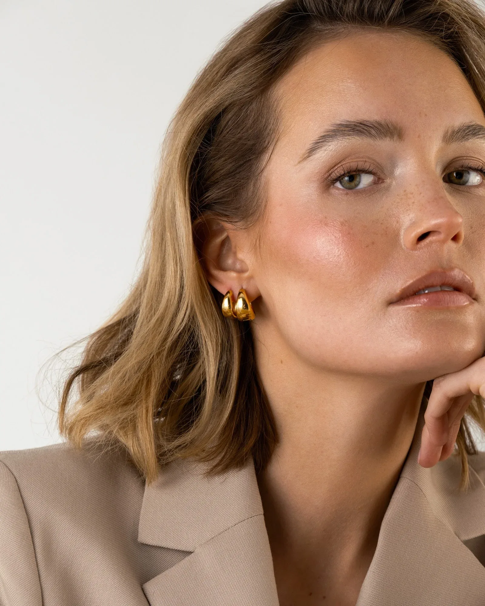 Gold plated steel bold hoop earrings
