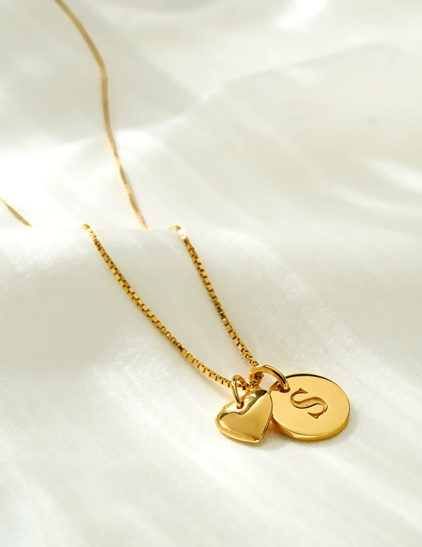Gold plated silver heart charm pendant