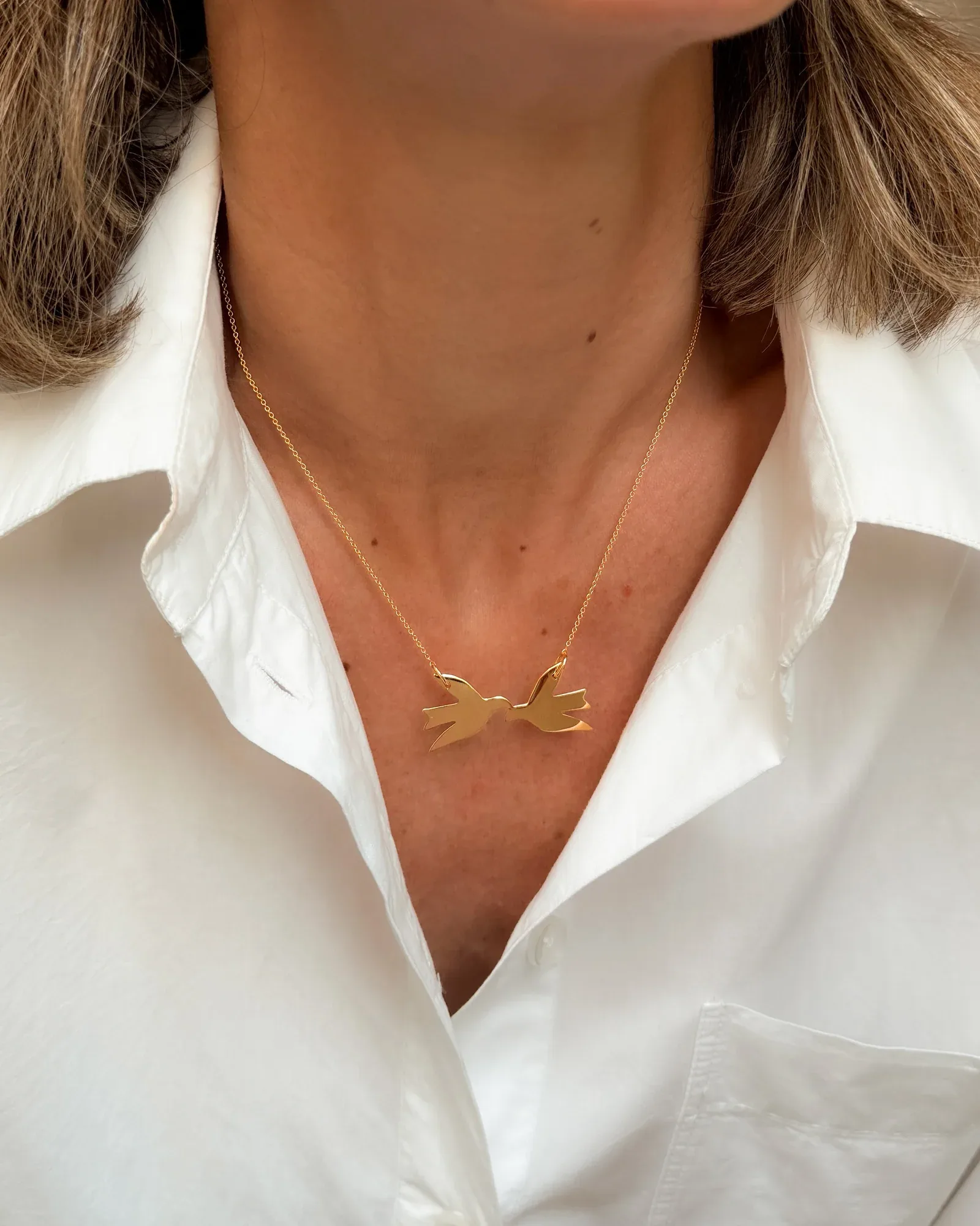 Gold two birds pendant necklace