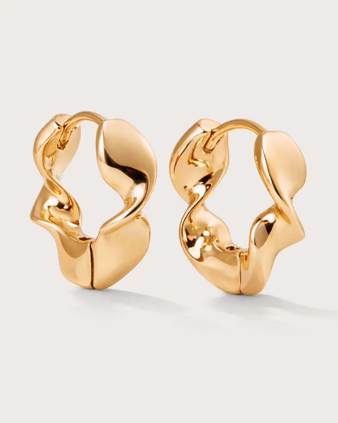 Gold plated twisted hoop earrings