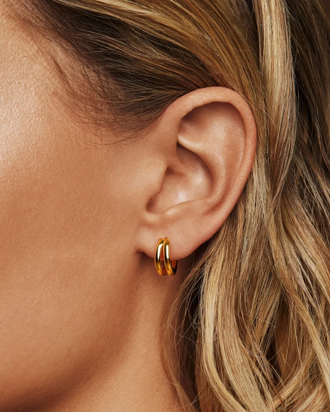 Gold plated twist hoop earrings