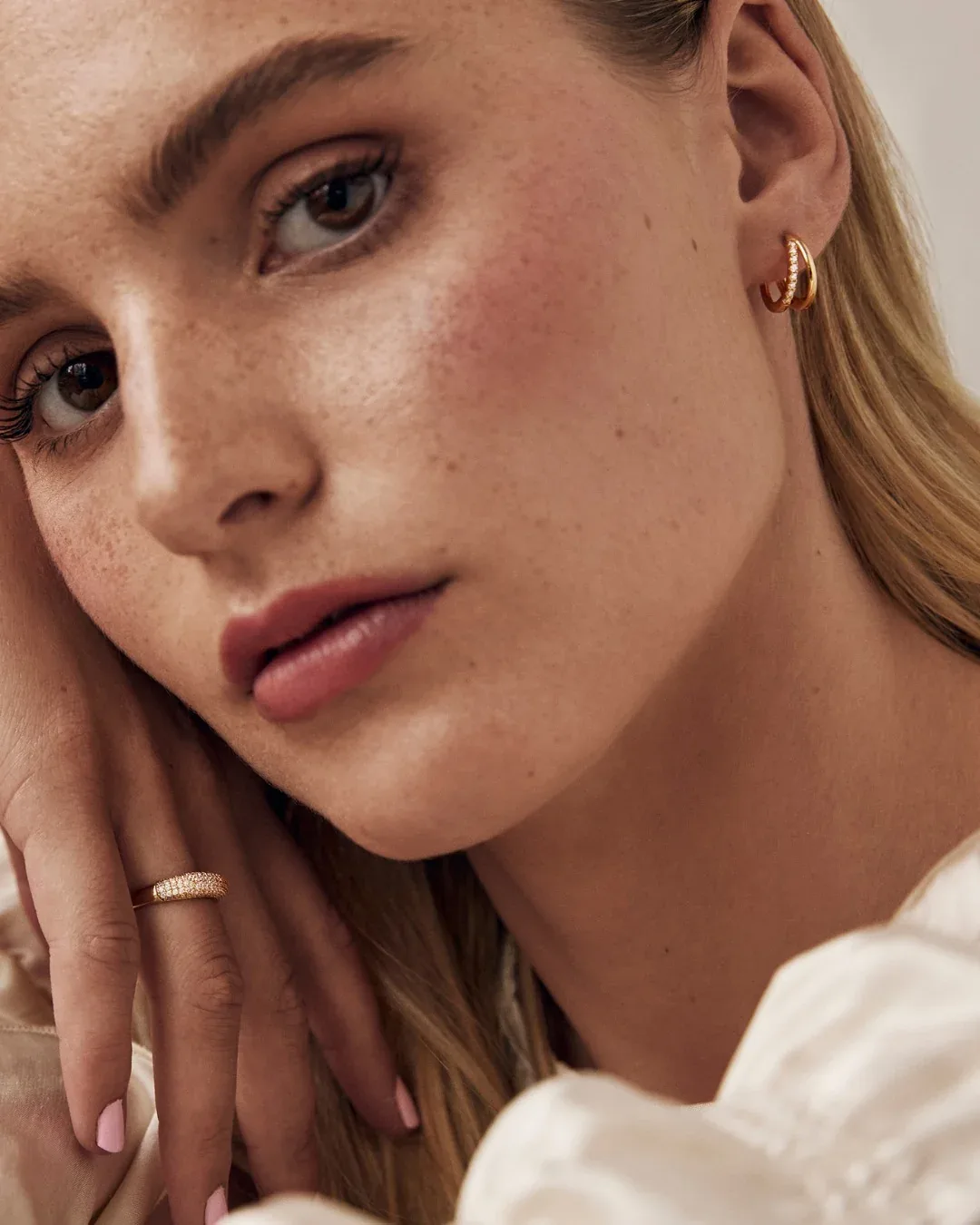 Gold plated crystal huggie hoop earrings