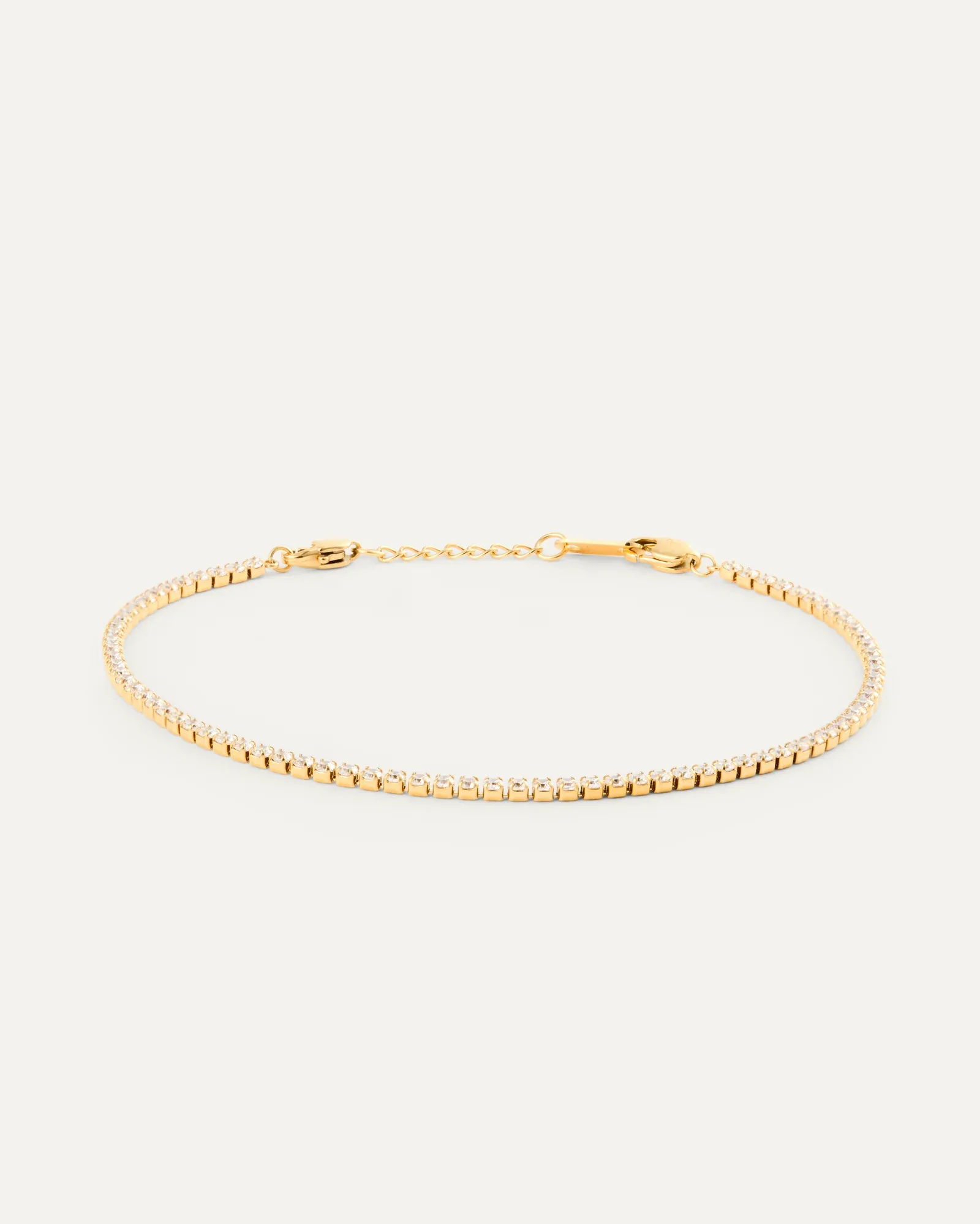 Gold plated steel tennis bracelet set with cubic zirconia