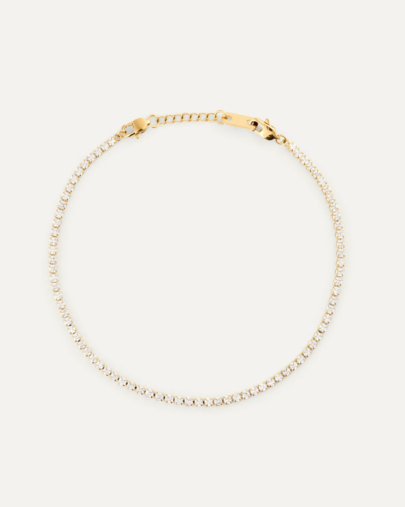 Gold plated steel tennis bracelet set with cubic zirconia