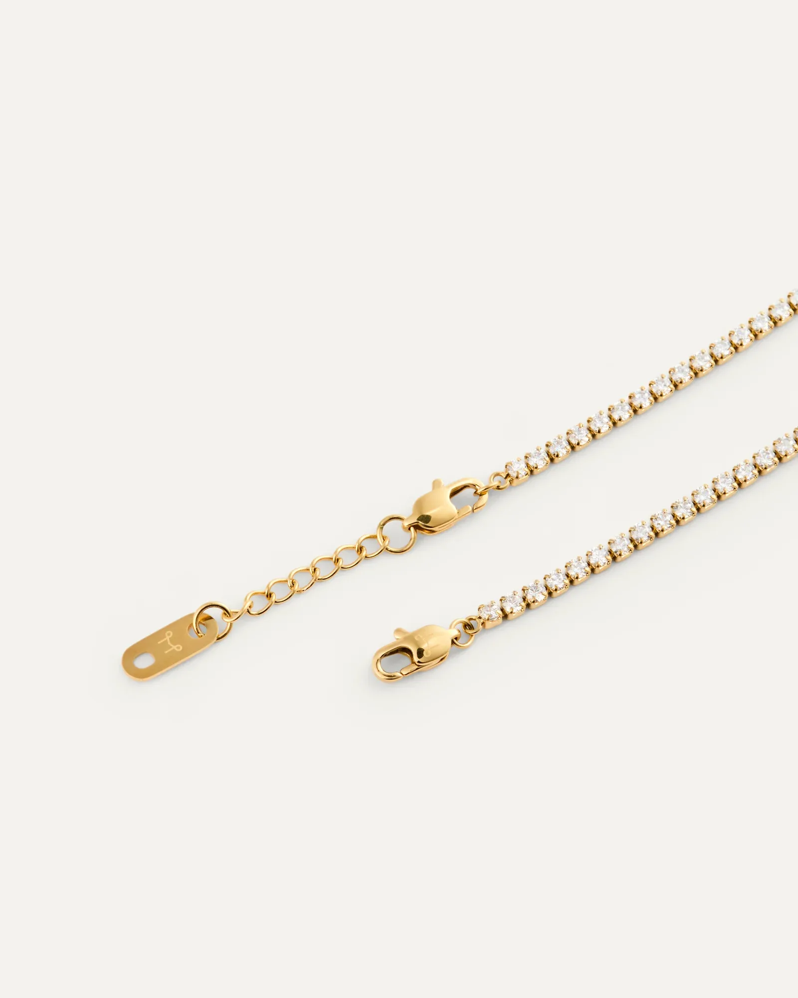 Gold plated steel tennis bracelet set with cubic zirconia