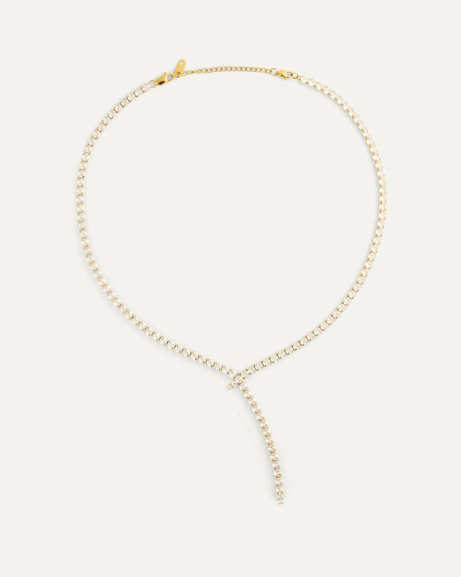 Gold plated steel lariat necklace set with cubic zirconia