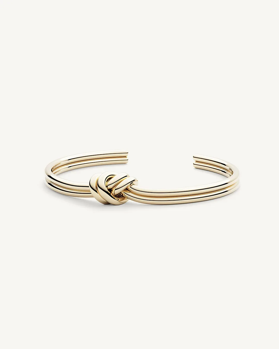 Gold plated steel double knot bangle