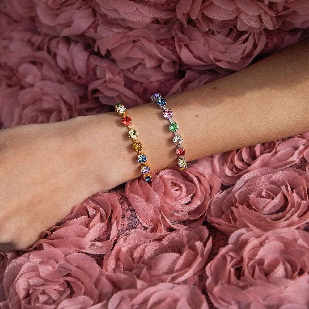 Gold bracelet set with multicoloured crystals