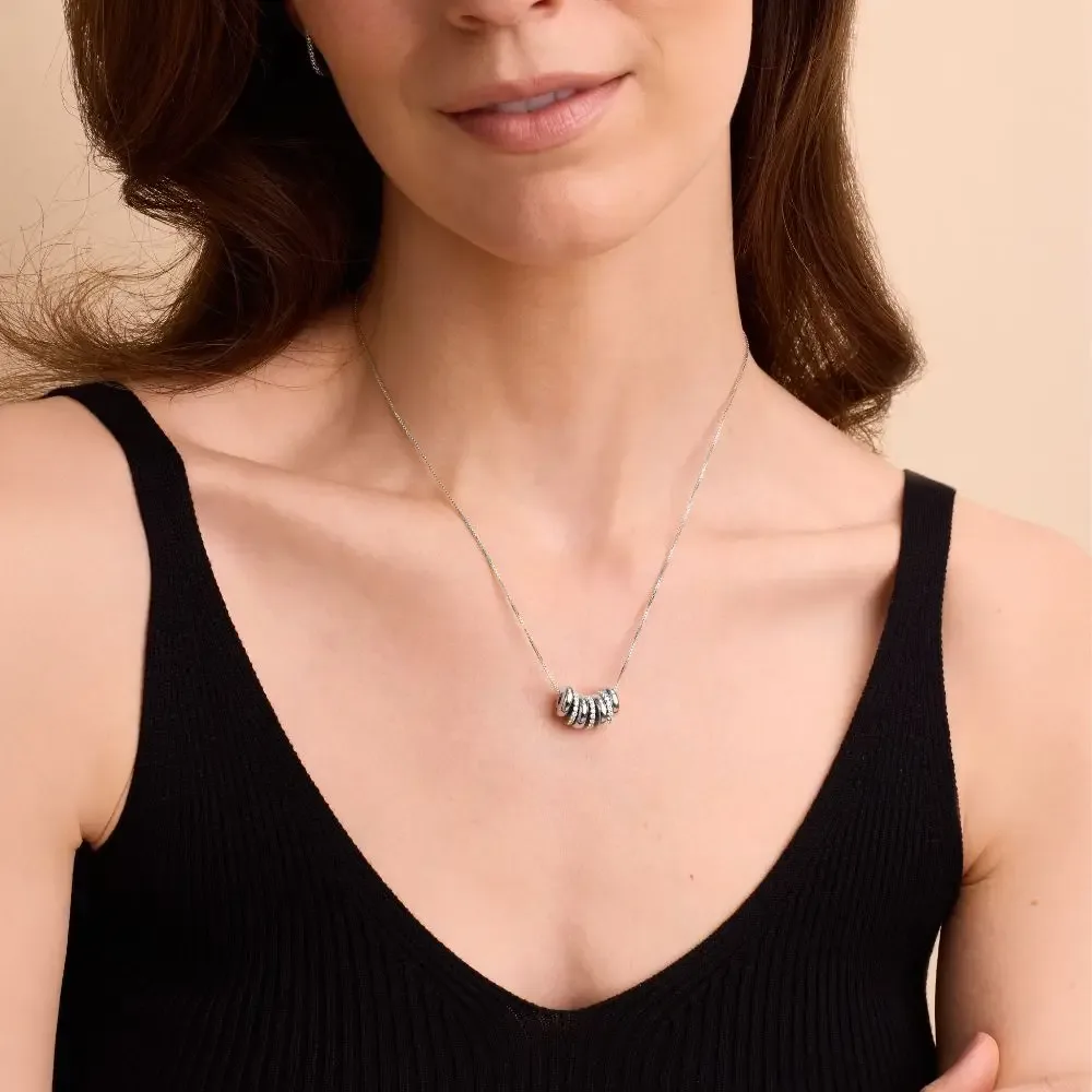 Sterling silver necklace with engraved name beads and crystals