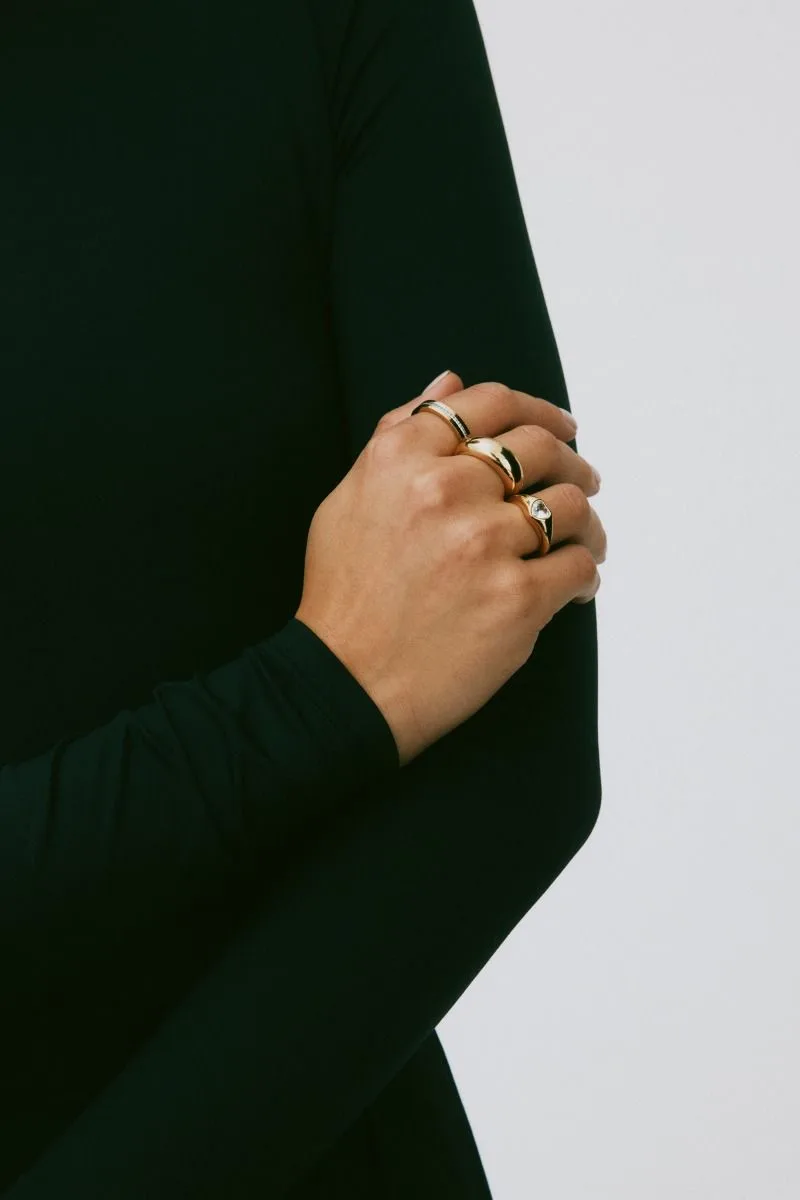 Wide domed band ring in gold plated stainless steel