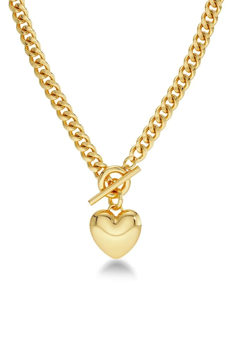 Small puffed heart pendant necklace in gold plated stainless steel