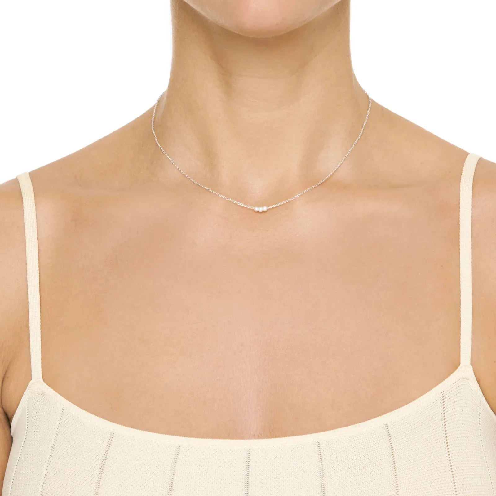 Three small freshwater pearls on a fine sterling silver chain