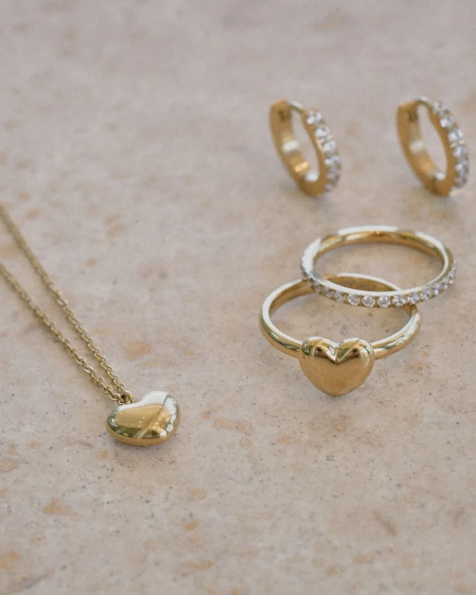 Small puffed heart pendant necklace in gold plated stainless steel