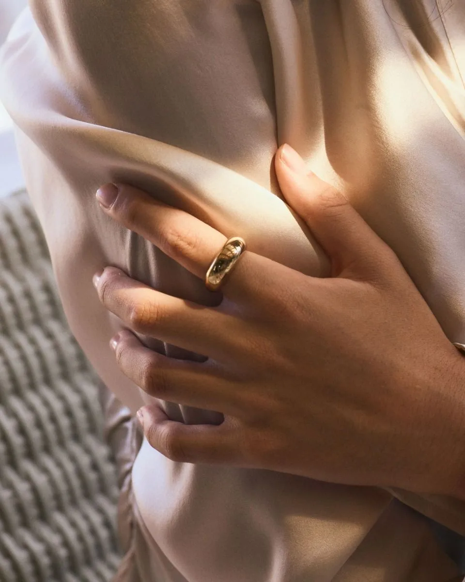 Wide domed band ring in gold plated stainless steel